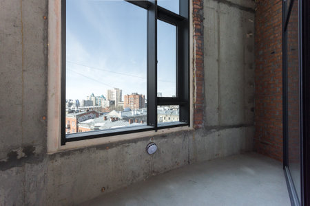 the balcony of an apartment on the upper floors of an apartment building