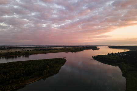 Aerial view of sunset over the river. Beautiful summer landscape.の写真素材
