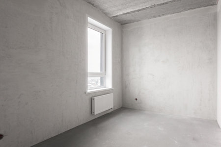 interior of the apartment without decoration in gray colors. rough finishの写真素材