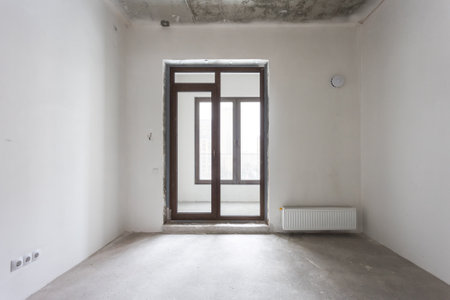 interior of the apartment without decoration in gray colors. rough finishの写真素材