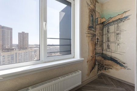 the balcony of an apartment on the upper floors of an apartment buildingの写真素材