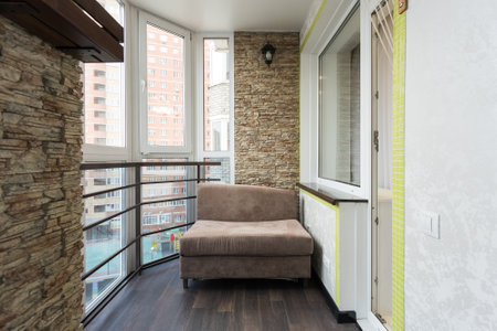 the balcony of an apartment on the upper floors of an apartment buildingの写真素材