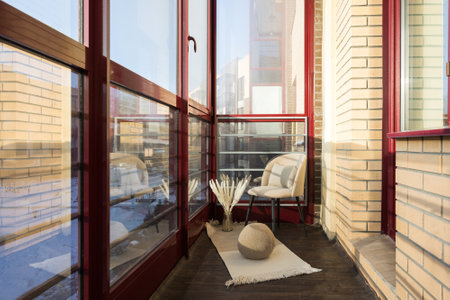 the balcony of an apartment on the upper floors of an apartment buildingの写真素材