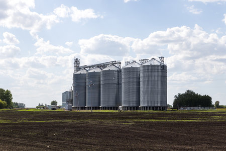 Modern silos for storing grain and cereals. Agricultural equipment.の写真素材