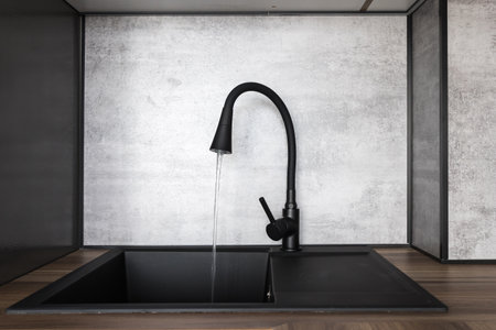 kitchen faucet on a metal sink
