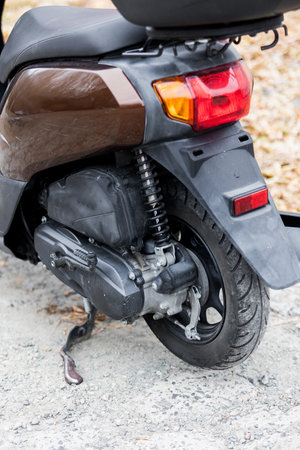 details and elements of a scooter nearby
