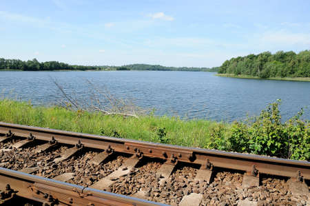 railway track along the coast of the beautiful lake