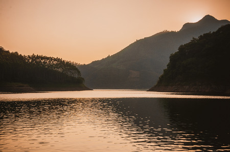 The mountains and lake scenery in sunsetの写真素材
