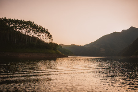 The mountains and lake scenery in sunsetの写真素材