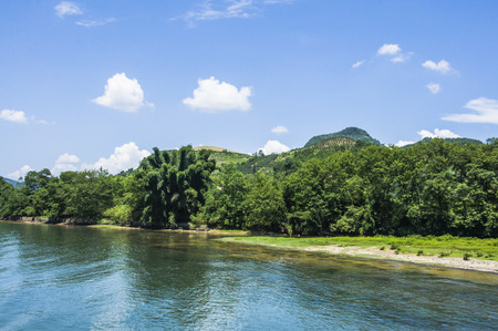 The Lijiang River and karst mountains scenery with blue skyの写真素材