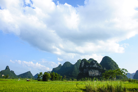 Karst mountains and rural scenery in summerの写真素材
