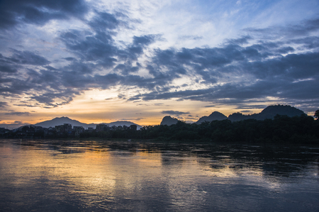 The sunrise scenery at lijiang lake, China.の写真素材
