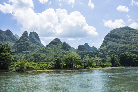 The Lijiang river and karst mountains scenery in autumnの写真素材