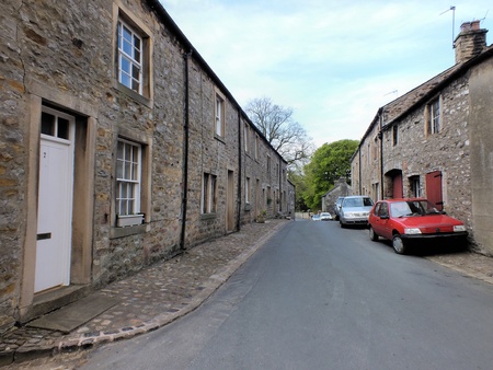 Slaidburn is a village in the Forest of Bowland Area of Outstanding Natural Beauty, Lancashire, with a population of just under 300  Historically in the West Riding of Yorkshire, Slaidburn can trace its history back to the 14th century のeditorial素材