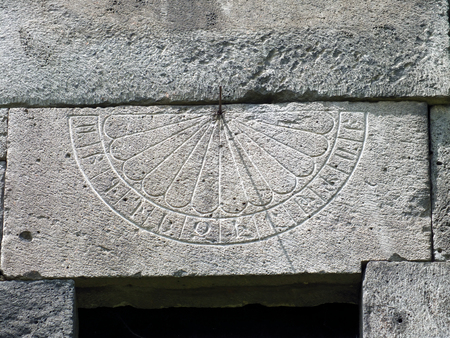 A sundial on a wall at Haghpat Monastery in Armeniaの写真素材
