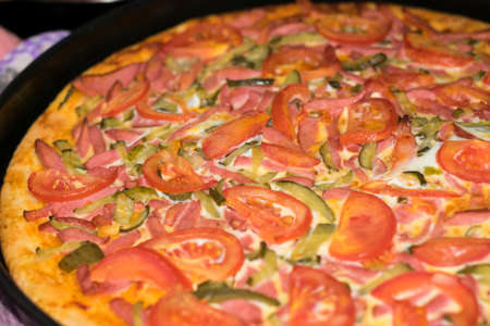 pizza, homemade. cooked in the oven. without harmful ingredients.の写真素材