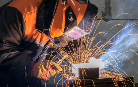 Welders working at the plant produce metal structures.