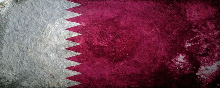 A dirty, grunge design of the flag of Qatarの写真素材