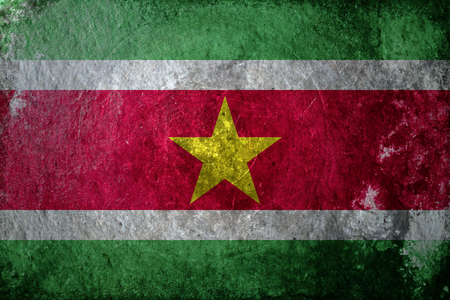 A dirty, grunge design of the flag of Surinameの写真素材