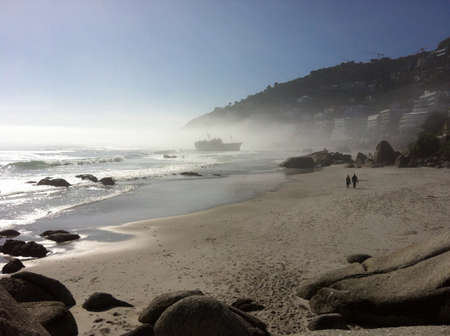 Beached ship on a swimming beachの素材