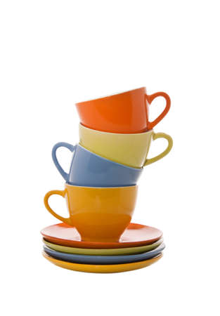 Set of colorful cups pyramid isolated on white backgroundの写真素材