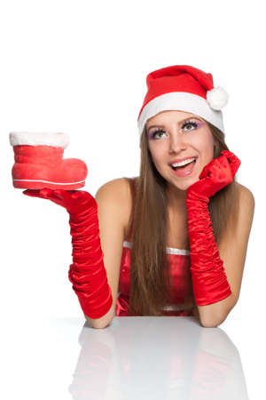christmas girl wearing red santa hat over white backgroundの写真素材