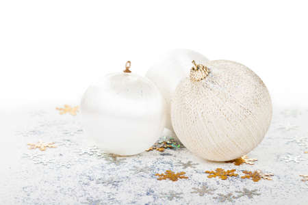 Three christmas balls isolated over white backgroundの写真素材