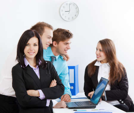young business people in office at the deskの写真素材