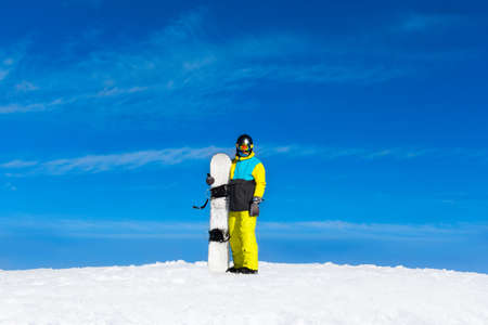 snowboarder standing hold snowboardの写真素材