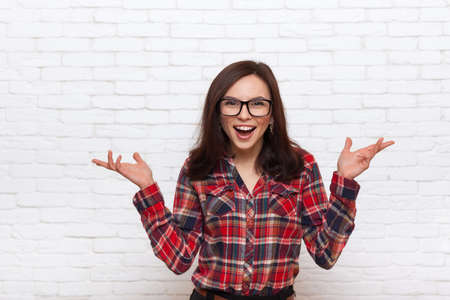 Excited Woman Happy Smile Over White Brick Office Wall Girl Wear Glasses Checked Shirt