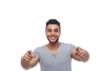 Casual Man Point Finger At You Happy Smile Young Handsome Guy Wear Shirt Isolated White Backgroundの写真素材