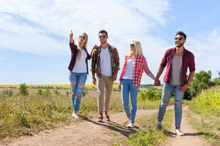 People group friends walking countryside road two couple happy smile, summer sunny day