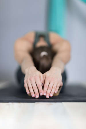 Woman Doing Yoga Exercises In Gym, Sport Fitness Girl Training Stretching Studioの写真素材