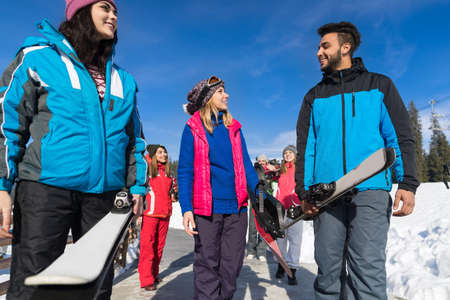 Group Of People Ski And Snowboard Resort Winter Snow Mountain Cheerful Happy Smiling Friends Talking Holiday Extreme Sport Vacationの写真素材