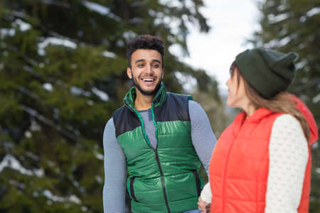 Young Mix Race Couple Snow Forest Outdoor Winter Walk Pine Woods