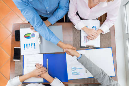 Business People Handshake, Meeting Businessman Sitting At desk Teamwork Group Conference Discussing...