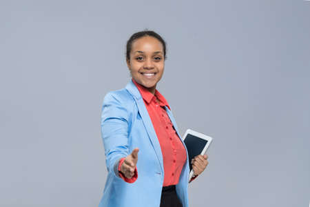 Young Business Woman Hold Tablet Computer African American Girl Handshake Welcome Gesture...