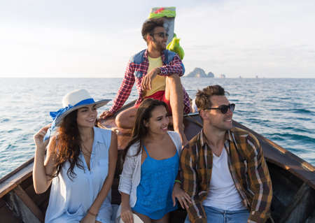 Young People Group Tourist Sail Long Tail Thailand Boat Ocean Friends Sea Vacation Travel Trip Tropical Holidayの写真素材