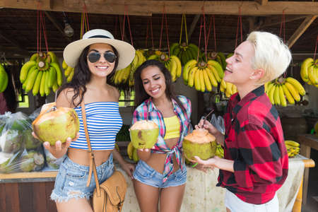 Girld Group Drick Coconut Cocktail Asian Fruits Street Market Buying Fresh Food, Young Friends...