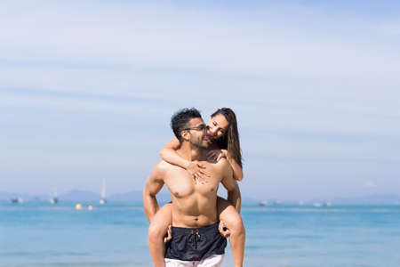 Couple On Beach Summer Vacation, Young People Happy Smiling, Man Carry Woman Sea Ocean Holiday...