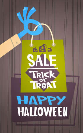 Halloween Sale Holiday Seasonal Discount Concept Monster Hand Holding Shopping Bag Flat Vector Illustration.のイラスト素材