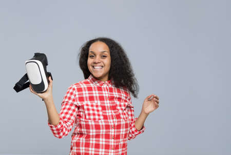 Young Woman Hold Virtual Reality Digital Glasses African American Girl Happy Smile Isolated Over...