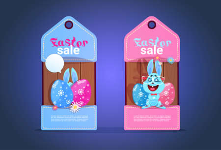 Happy Easter sale tags with cute bunny and colorful eggs vector illustrationのイラスト素材