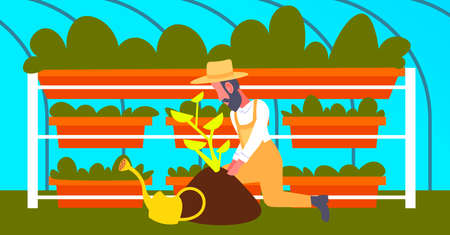 bearded gardener planting young plant in greenhouse garden vertical farm interior organic gardening concept male cartoon character full length flat horizontal vector illustrationのイラスト素材