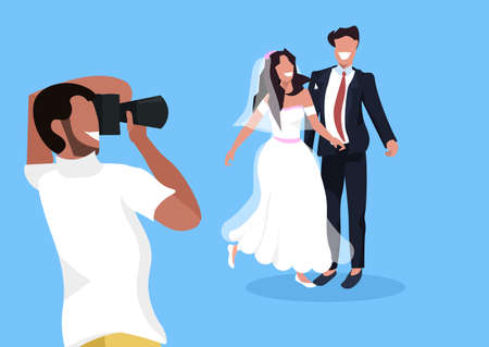 wedding photographer shooting on camera newlyweds man woman couple posing together man taking professional photo horizontal flat vector illustrationのイラスト素材