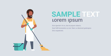 man in gloves and apron washing floor african american guy using mop doing housework cleaning concept flat horizontal copy space gray background full length vector illustrationのイラスト素材