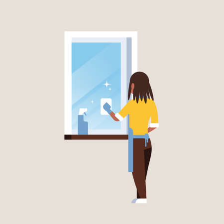 woman in gloves and apron cleaning window with rag cleaner spray rear view african american housewife doing housework concept flat full length vector illustrationのイラスト素材