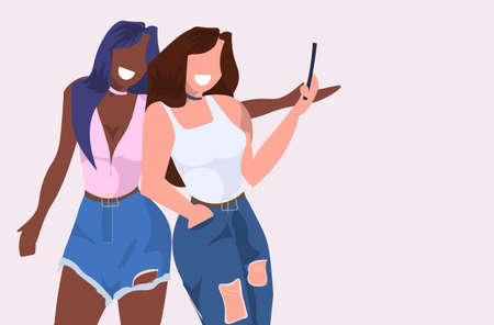 mix race women taking selfie photo on smartphone camera young girls standing together female cartoon characters posing flat portrait horizontal vector illustrationのイラスト素材