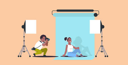 professional photographer using camera man shooting beautiful sexy african american woman model posing modern photo studio horizontal full length flat vector illustrationのイラスト素材