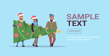 people carrying fir tree preparing for merry christmas happy new year holiday celebration concept mix race friends wearing santa hats copy space horizontal full length vector illustrationのイラスト素材
